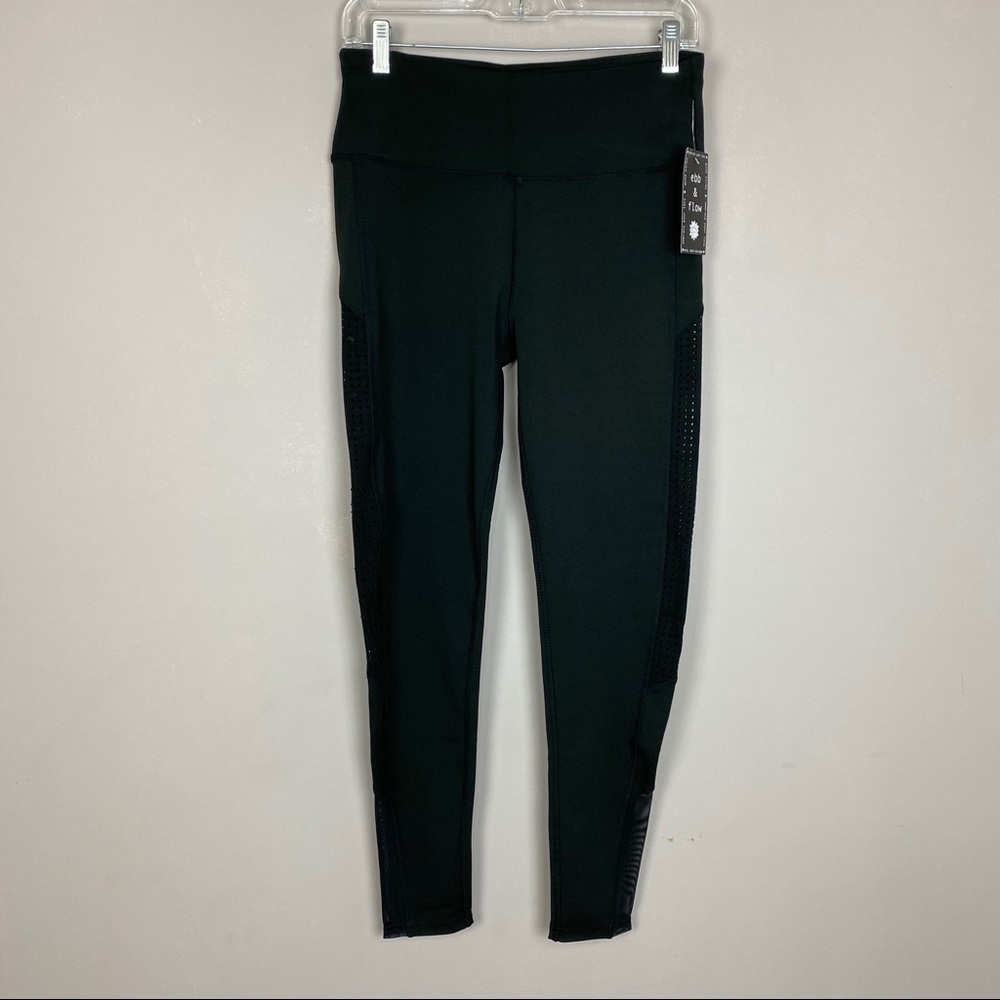 Size Med black leggings laser cutouts mesh details